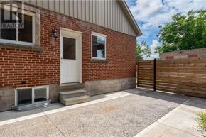 Hamilton (Rosedale) apartment for rent - A house with a white door and a brick wall.