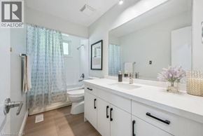 Guelph apartment for rent - A bathroom with a white counter top and a white sink.