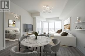 Mississauga (Clarkson) condo for rent - A modern living room with a round marble table and grey chairs.