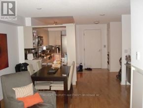 Toronto (Bay Street Corridor) condo for rent - A dining room with a table and chairs is shown.