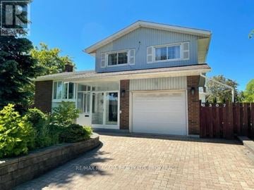 Niagara Falls (Morrison) apartment for rent - A two-story house with a garage is for sale.