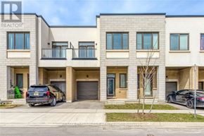 Oakville (Go Glenorchy) townhouse for rent - A modern two-story building with a balcony on the second floor.