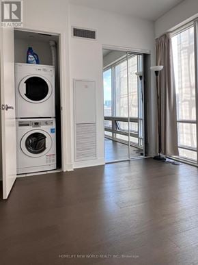 Toronto (Bay Street Corridor) condo for rent - A laundry room with a washer and dryer in it.