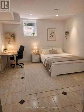 Markham (Middlefield) apartment for rent - A bedroom with a bed, desk, and chair.