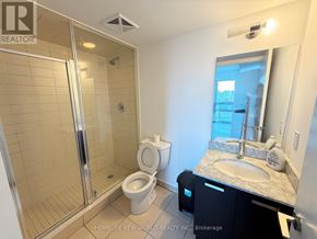 Toronto (Little Portugal) condo for rent - A bathroom with a toilet, sink, and shower.