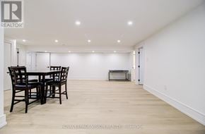Toronto (Cliffcrest) apartment for rent - A dining room with a table and chairs.