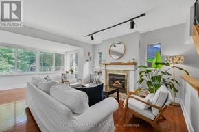 Toronto (Cliffcrest) apartment for rent - A living room with a fireplace and a couch.