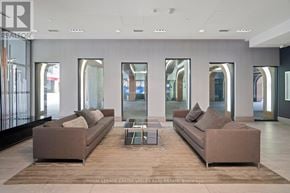 Toronto (Waterfront Communities) condo for rent - A living room with two couches and a coffee table.