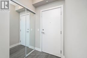 Toronto (Waterfront Communities) condo for rent - A white door is on the right and a glass door is on the left.