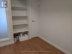 Toronto (Woodbine Corridor) apartment for rent - A white closet with shelves and a door.