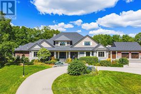 Burlington (Grindstone) apartment for rent - A large, well-maintained house with a driveway leading to the front door.