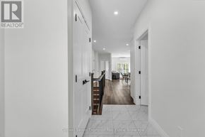 Huntsville (Brunel) apartment for rent - A hallway with a wooden floor and white walls.