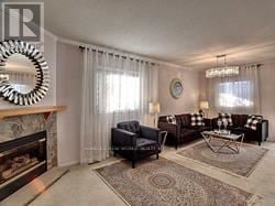 Newmarket (Summerhill Estates) apartment for rent - A living room with a fireplace and a mirror on the wall.