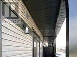 Kitchener townhouse for rent - A long building with a sign that says "Salton" on it.