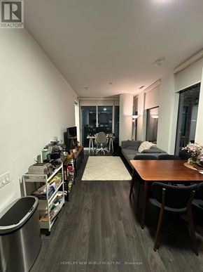 Toronto (Church-Yonge Corridor) condo for rent - A living room with a couch, chairs, and a coffee table.