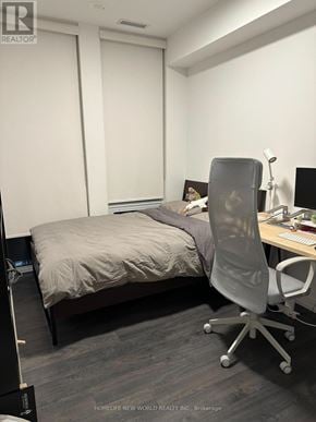 Toronto (Church-Yonge Corridor) condo for rent - A bedroom with a bed, desk, and chair.