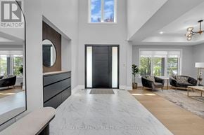 Oakville (Wo West) apartment for rent - A modern living room with a marble floor and a large mirror on the wall.