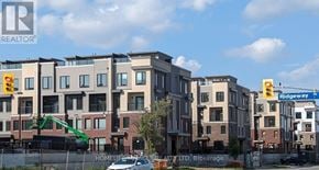 Mississauga (Erin Mills) townhouse for rent - A row of new apartment buildings are under construction.