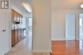 Toronto (Willowdale East) condo for rent - A real estate listing image of a kitchen and living room.