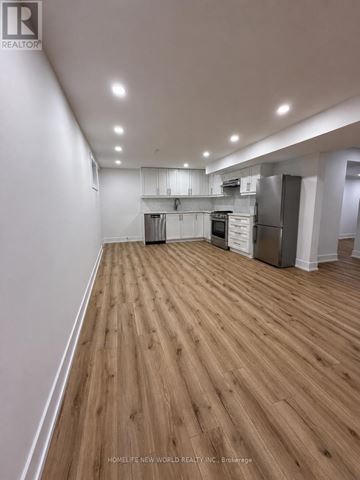 Markham (Aileen-Willowbrook) apartment for rent - A spacious kitchen with wooden flooring and stainless steel appliances.