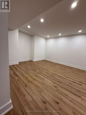 Markham (Aileen-Willowbrook) apartment for rent - A room with wooden flooring and white walls.