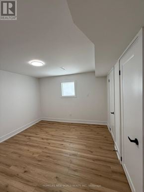 Markham (Aileen-Willowbrook) apartment for rent - A room with wooden flooring and white walls.