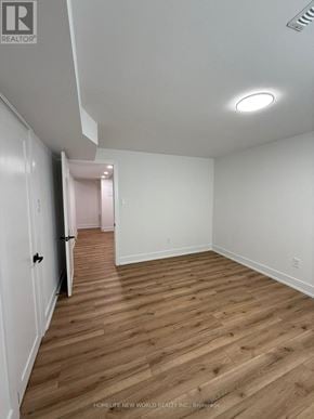 Markham (Aileen-Willowbrook) apartment for rent - A room with wooden flooring and white walls.