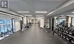 Toronto (Newtonbrook East) condo for rent - A gym with a variety of equipment including treadmills, weights, and exercise machines.