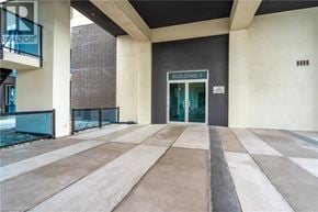 Grimsby condo for rent - The entrance to Building 1 is visible through the glass doors.