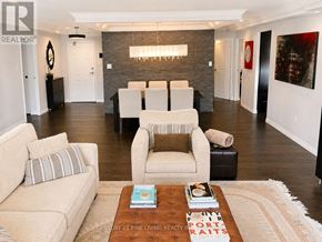 Toronto (Church-Yonge Corridor) condo for rent - A living room with a couch, chair, and coffee table.