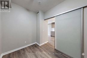 Toronto (Henry Farm) condo for rent - A room with a sliding glass door leading to another room.
