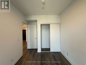 Toronto (Moss Park) condo for rent - A room with a doorway leading to another room.