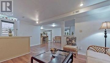Mississauga (Fairview) apartment for rent - A living room with a glass table and a sofa.