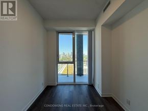 Toronto (Moss Park) condo for rent - A room with a view of the street outside.