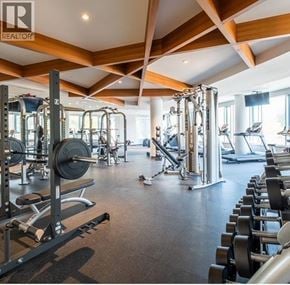 North Vancouver apartment for rent - A gym with a variety of equipment including weights and cardio machines.