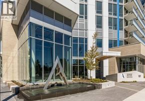 North Vancouver apartment for rent - A modern building with a fountain in front of it.