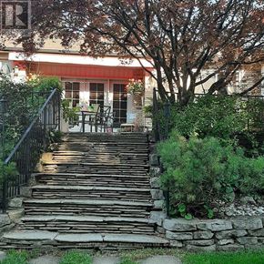 Hamilton (Waterdown) apartment for rent - A set of stone steps lead up to a house.