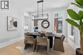 Oakville apartment for rent - A modern dining room with a large table and chairs.
