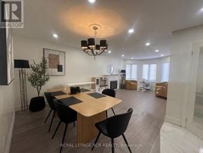 Shelburne apartment for rent - A dining room with a wooden table and chairs.