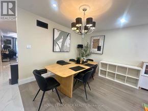 Shelburne apartment for rent - A dining room with a wooden table and chairs.