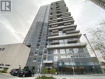 Toronto (Agincourt South-Malvern West) condo for rent - A tall building with a glass facade and a sign that reads "REALTOR".