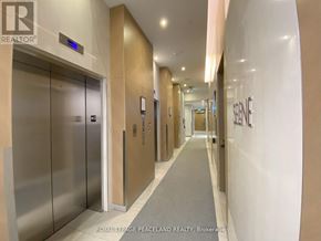 Toronto (Agincourt South-Malvern West) condo for rent - A hallway with elevators and doors on the left side.