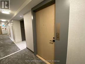 Toronto (Agincourt South-Malvern West) condo for rent - A hallway with a door numbered 410.