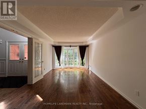 Aurora (Aurora Highlands) apartment for rent - A room with a wooden floor and a door leading to a balcony.