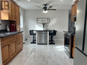 Mississauga (Cooksville) apartment for rent - A kitchen with a center island and a ceiling fan.