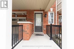 Brampton (Fletcher's West) townhouse for rent - A black door with a glass window is on the right side of the image.