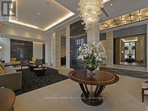 Toronto (High Park-Swansea) condo for rent - A large, elegant room with a round table and chairs.