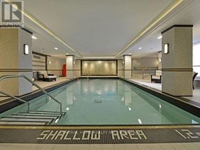 Toronto (High Park-Swansea) condo for rent - A pool area with a sign that says "Shadow Area".
