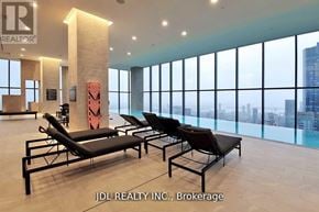Toronto (Bay Street Corridor) condo for rent - A brokerage office with a view of the city.