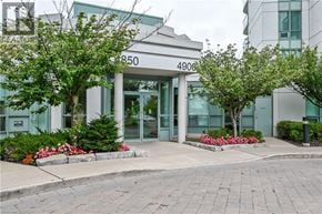 Mississauga condo for rent - The front of a building with the numbers 850 and 4900 on it.